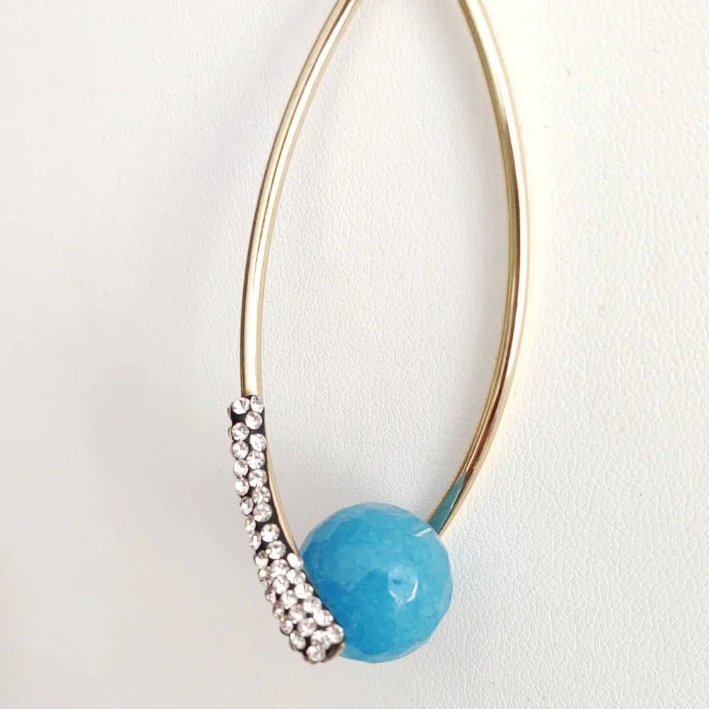 Blue bead, cz and gold pendant necklace